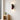 Retro-Wandleuchte Fårverig in einem eklektischen Interieur